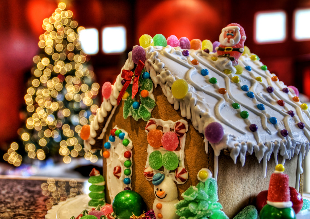 classic gingerbread house with snowman decor.