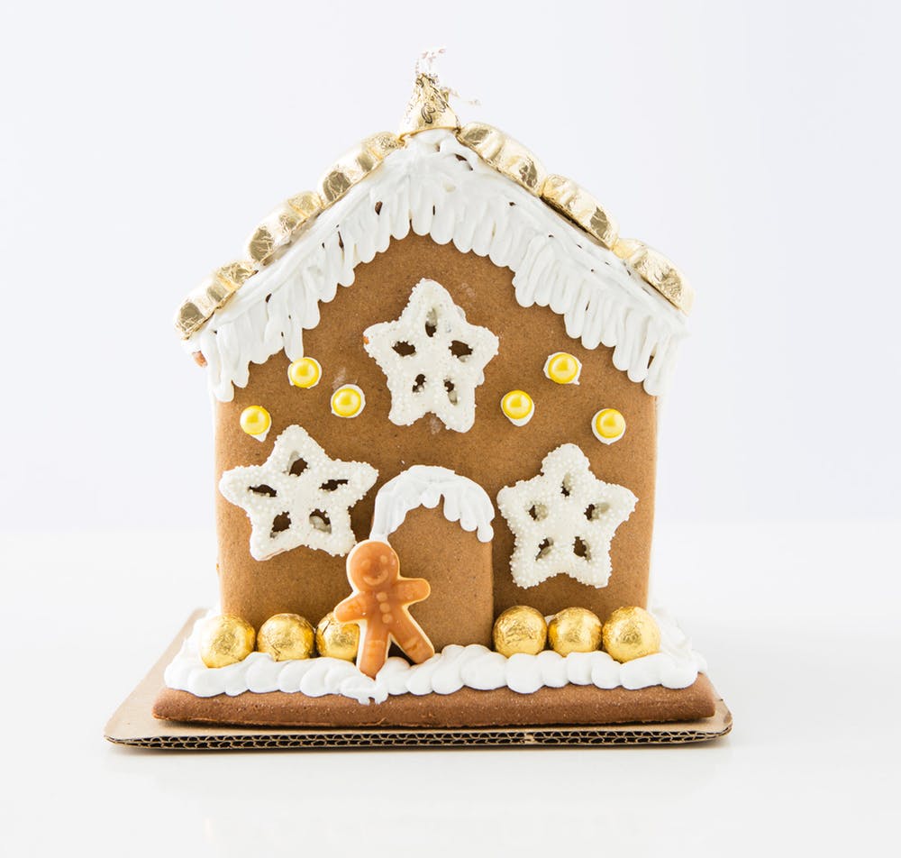 gold and foil hershey kiss gingerbread house decor.