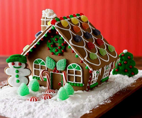 small and green gingerbread house house decorations.